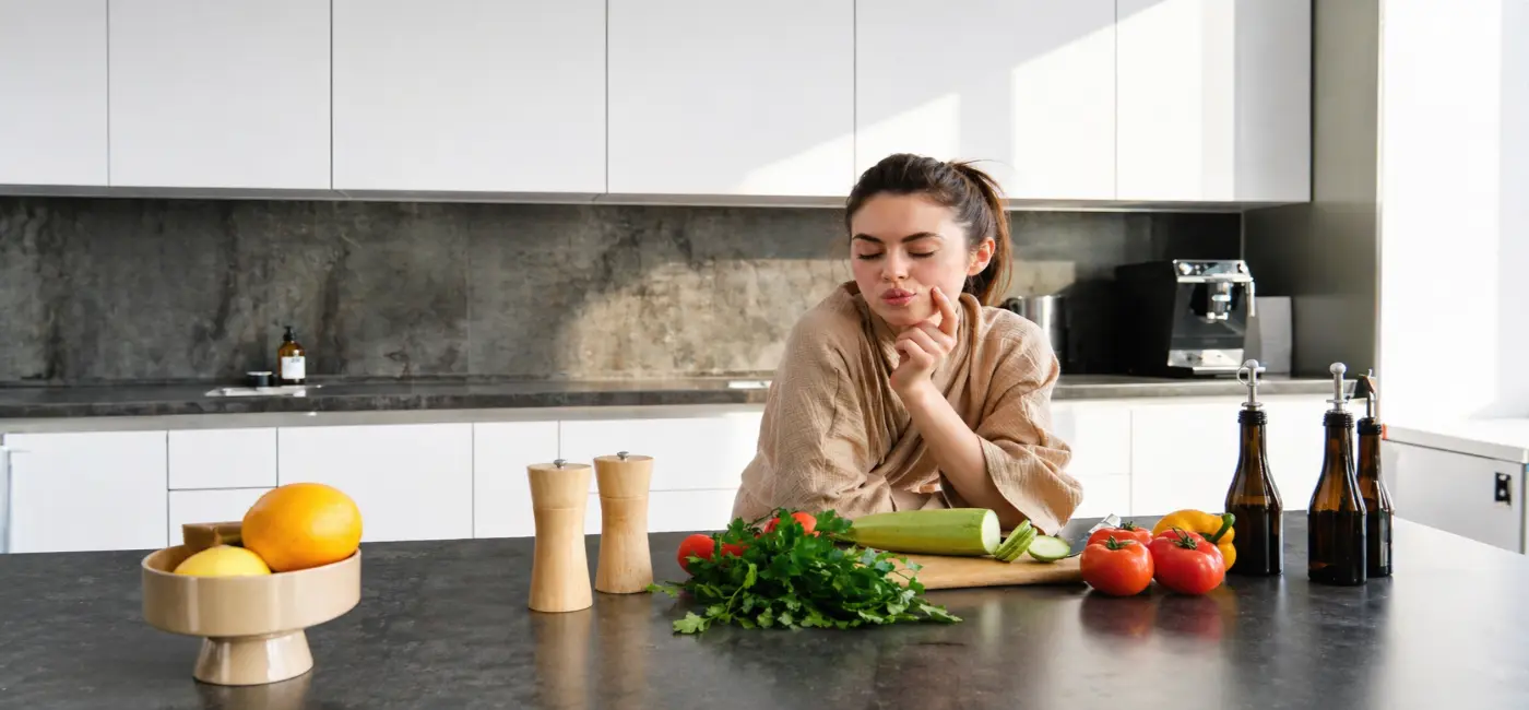 Woman choosing healthy food over junk diet for natural weight loss results